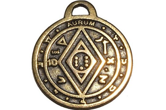 Charm de moneda para buena suerte y riqueza.